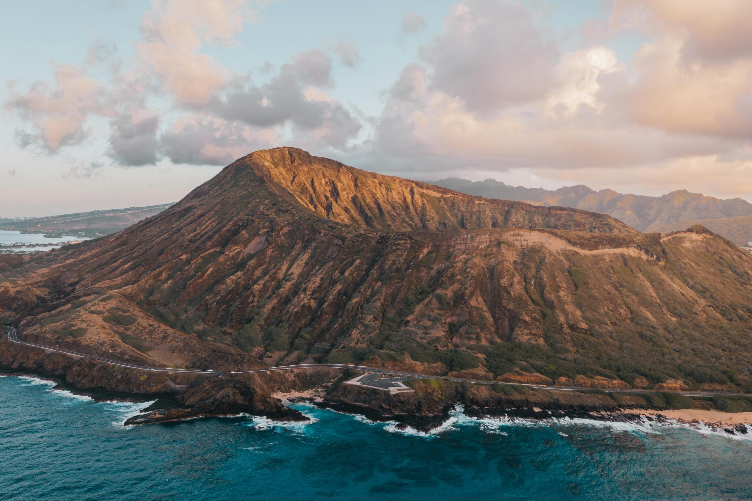 Epic aerial view of Koko Head in Hawaii, highlighting its volcanic landscape and scenic ocean backdrop.