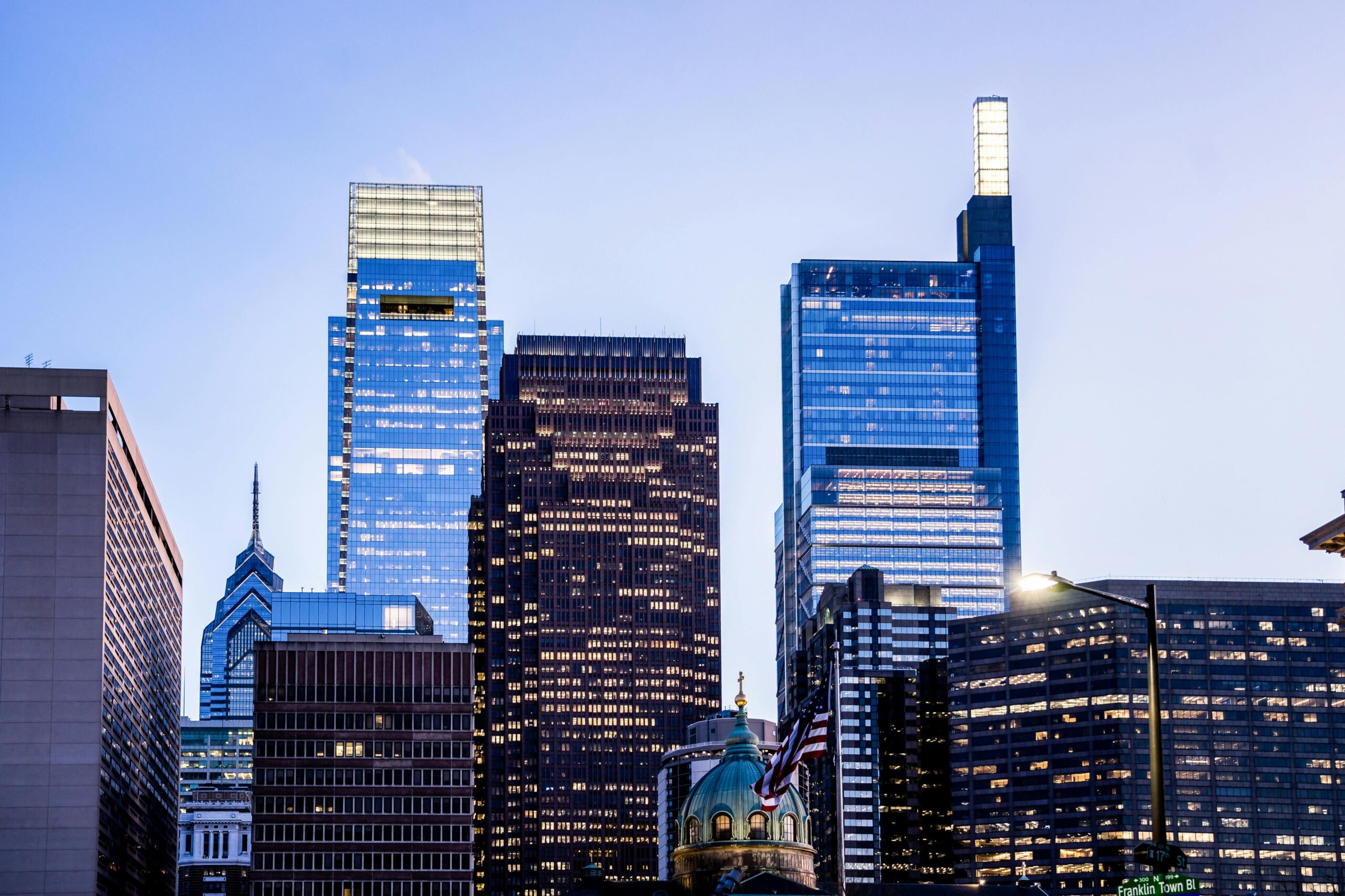 A stunning view of Philadelphia's skyline with iconic skyscrapers at dusk, showcasing urban beauty.