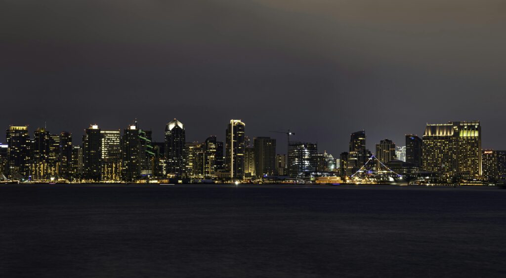 Beautiful night view of San Diego's downtown skyline illuminated across the bay.