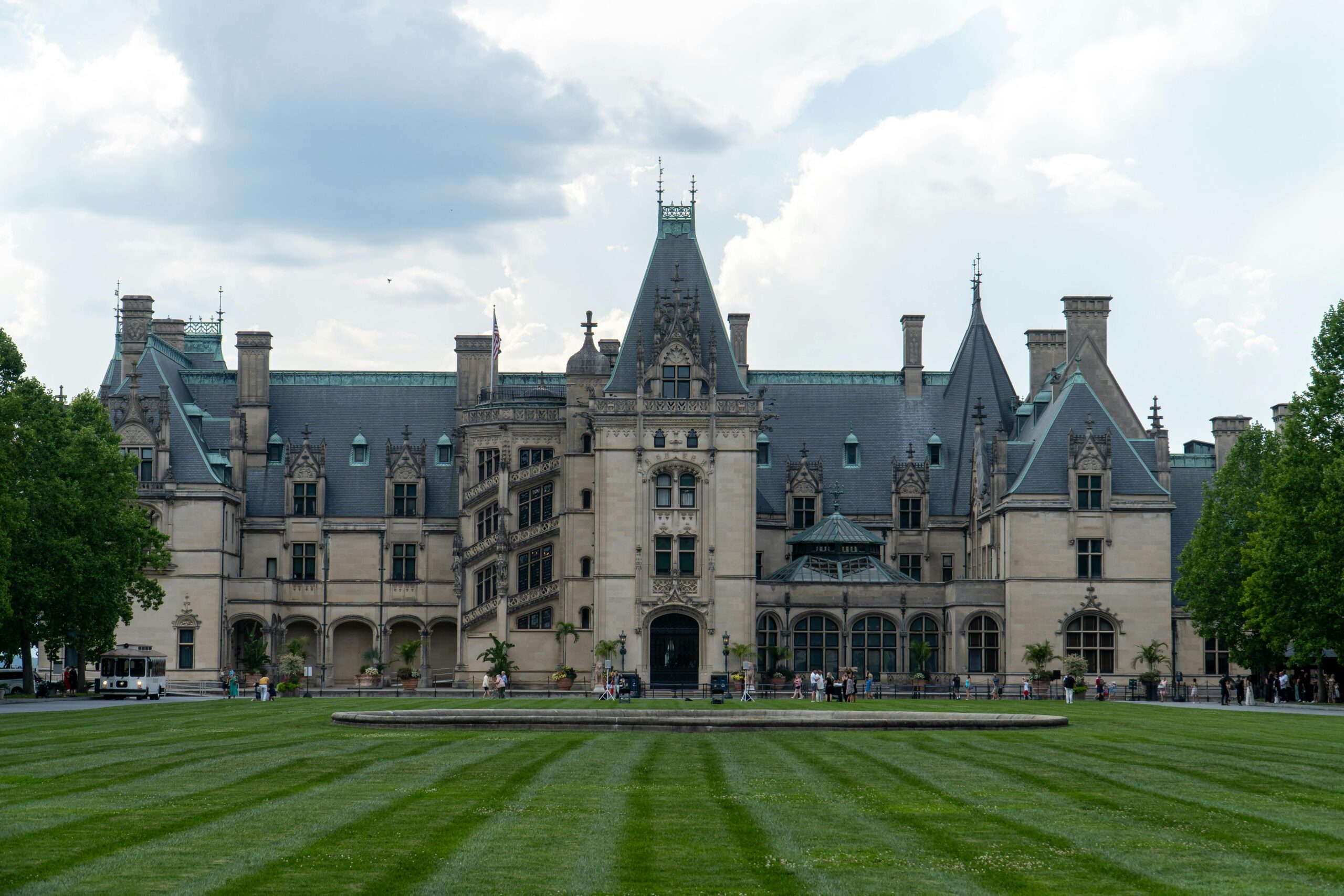 Elegant view of the Biltmore Estate, Asheville, NC, showcasing grand architecture and landscaped grounds.
