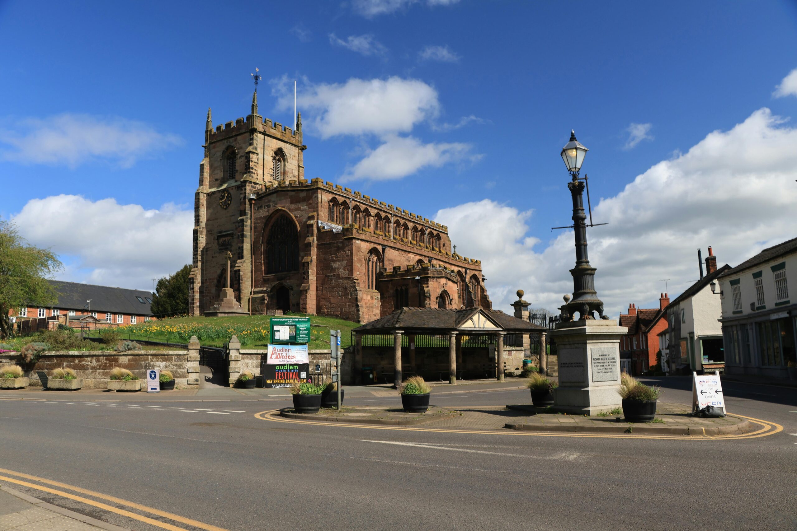 Historic English church with scenic sky, capturing cultural architecture elements and timeless charm.