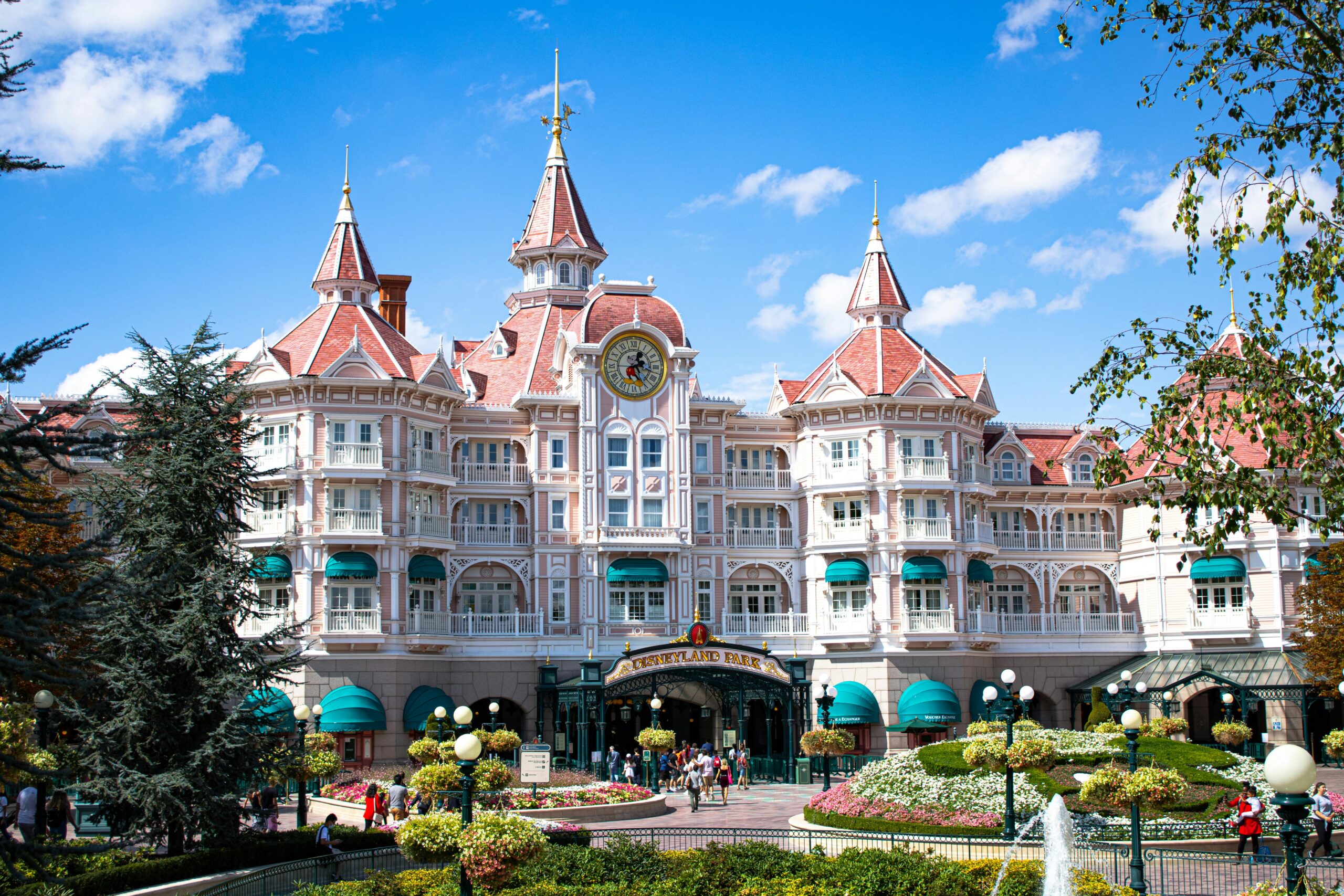 Beautiful hotel entrance at Disneyland Paris with blue sky.