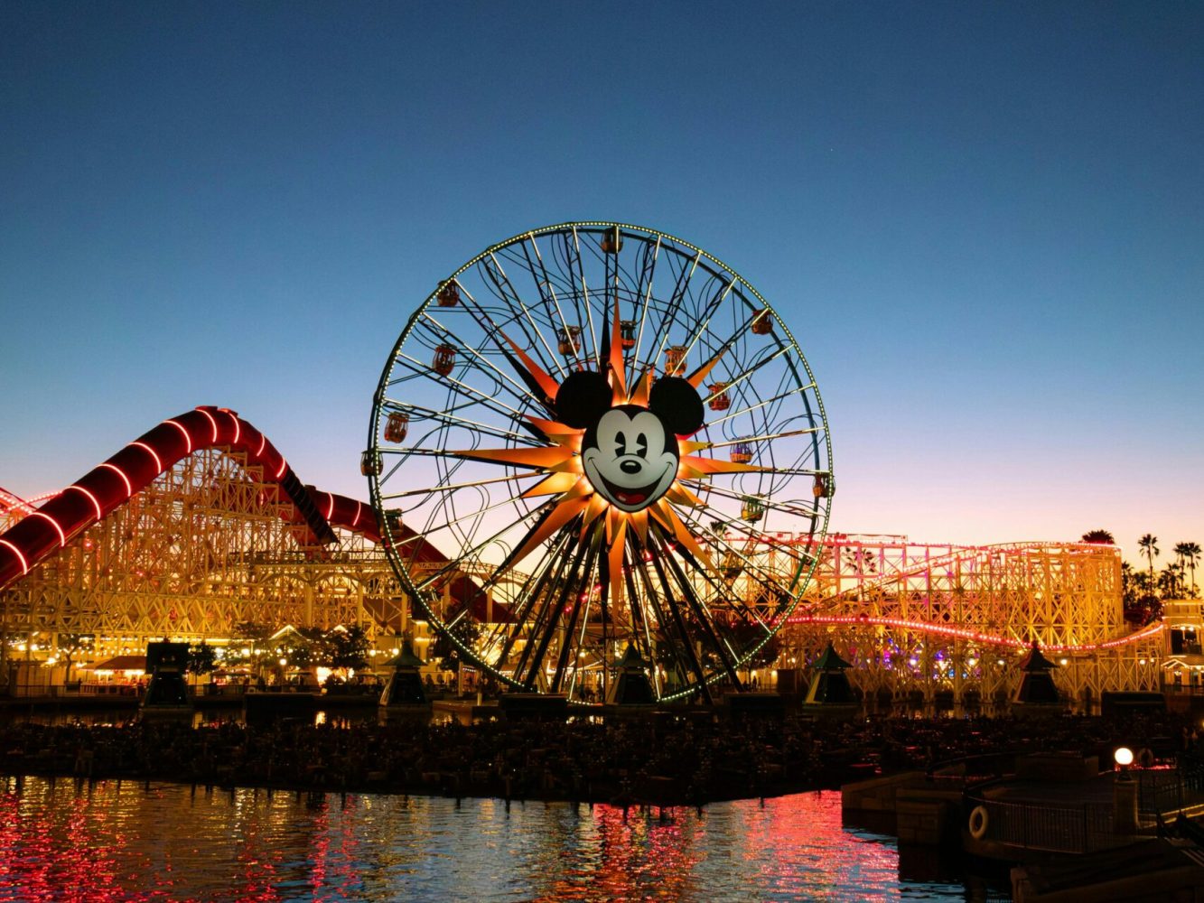 Stunning view of the Mickey Mouse Ferris Wheel at Disneyland California Adventure during sunset.